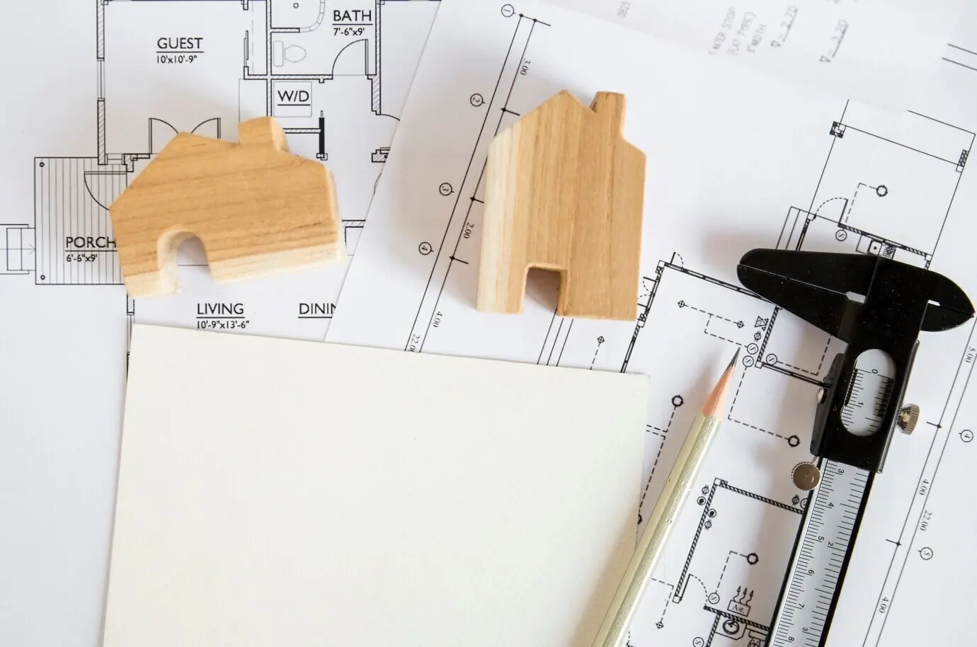 Images of a house and a caliper on drafts